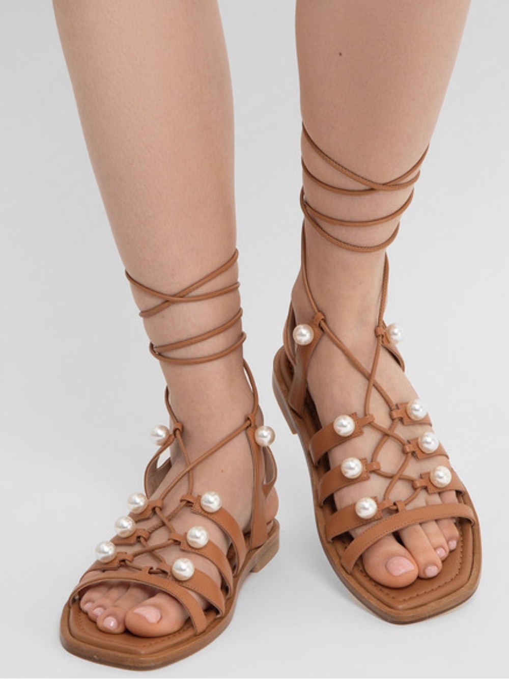{Stuart Weitzman} Goldie Pearl-Accent Lace-Up Sandals